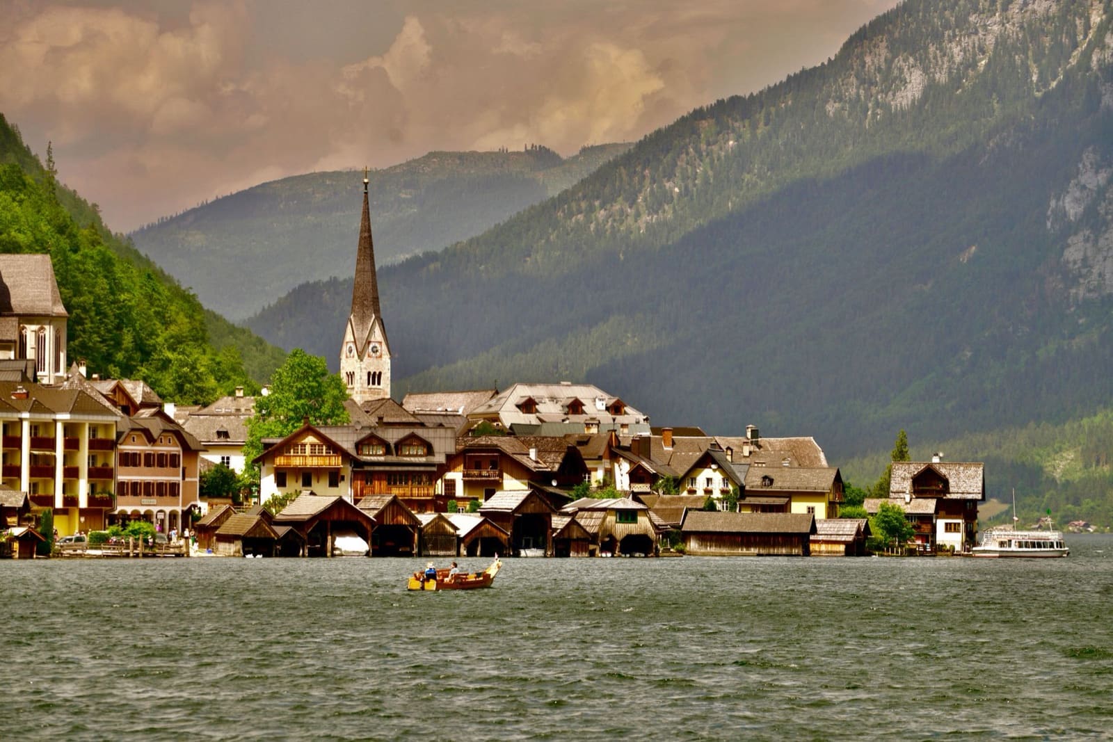 Stunning landscape of Hallstatt village by the lake with mountains in Austria.