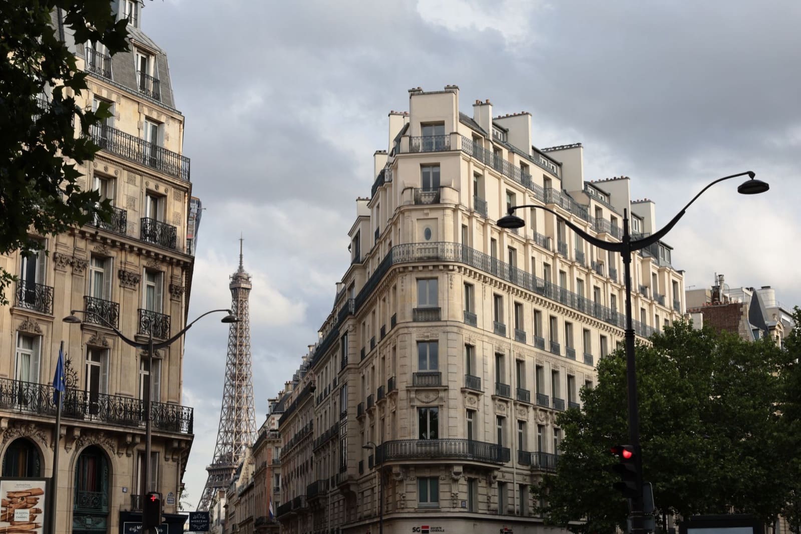 Charming urban scene of Paris street with iconic Eiffel Tower in the background.